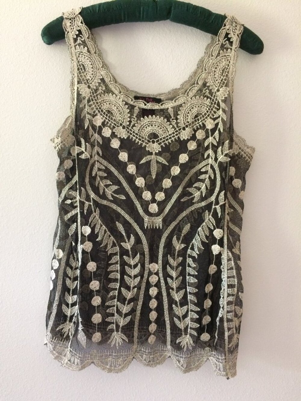 It’s pink tank top Size M